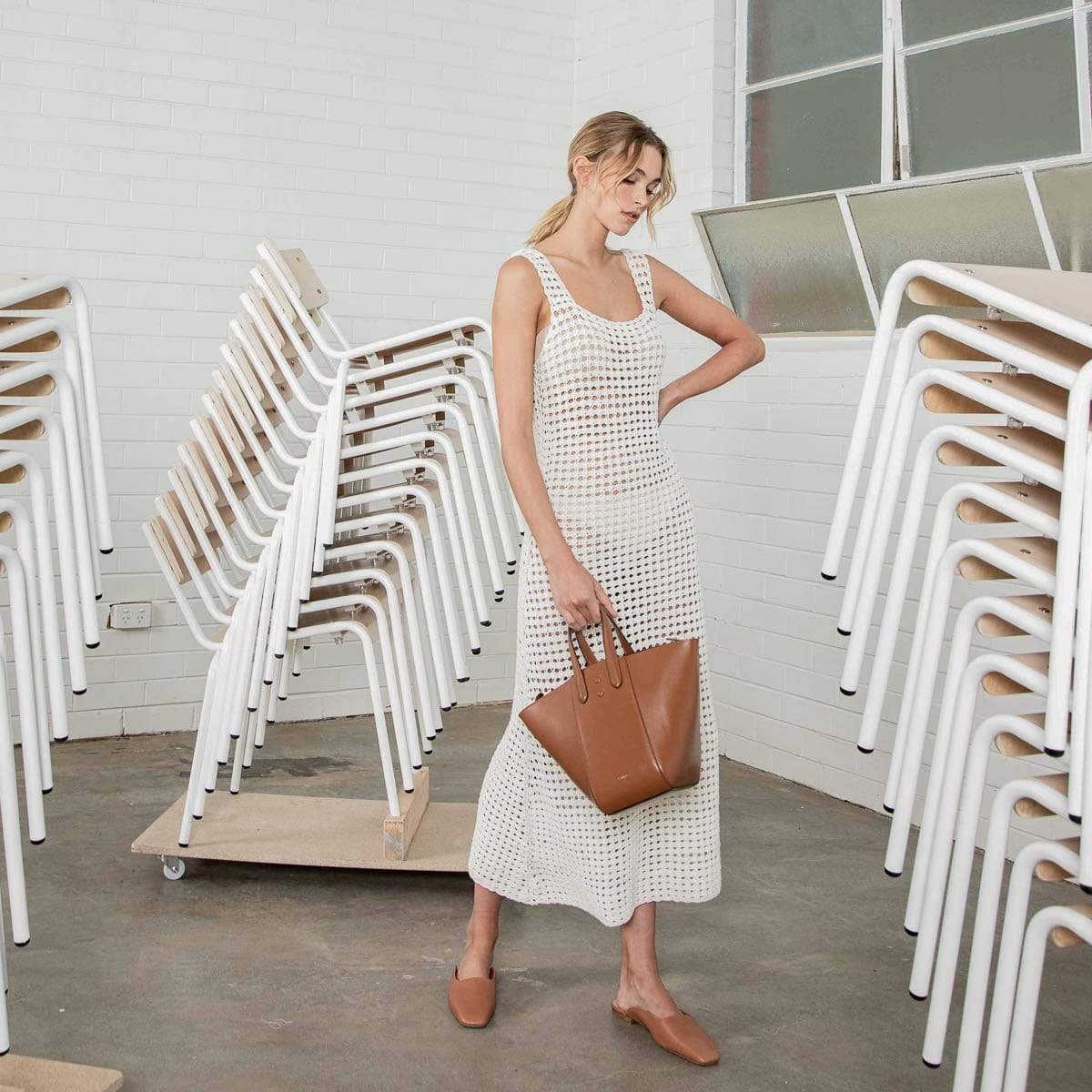 X NIHILO - EIGHT MINI TOTE BUCKET BAG - TAN Modelled with white dress